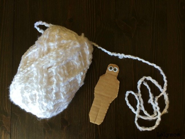 2 Fun Halloween Crafts for Kids - Yarn Wrap Mummies on Lalymom - cute and so easy!
