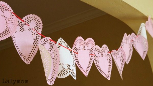 Valentines Day Heart Doily Garland - simple kid-made decoration that can be used as a Valentine themed busy bag
